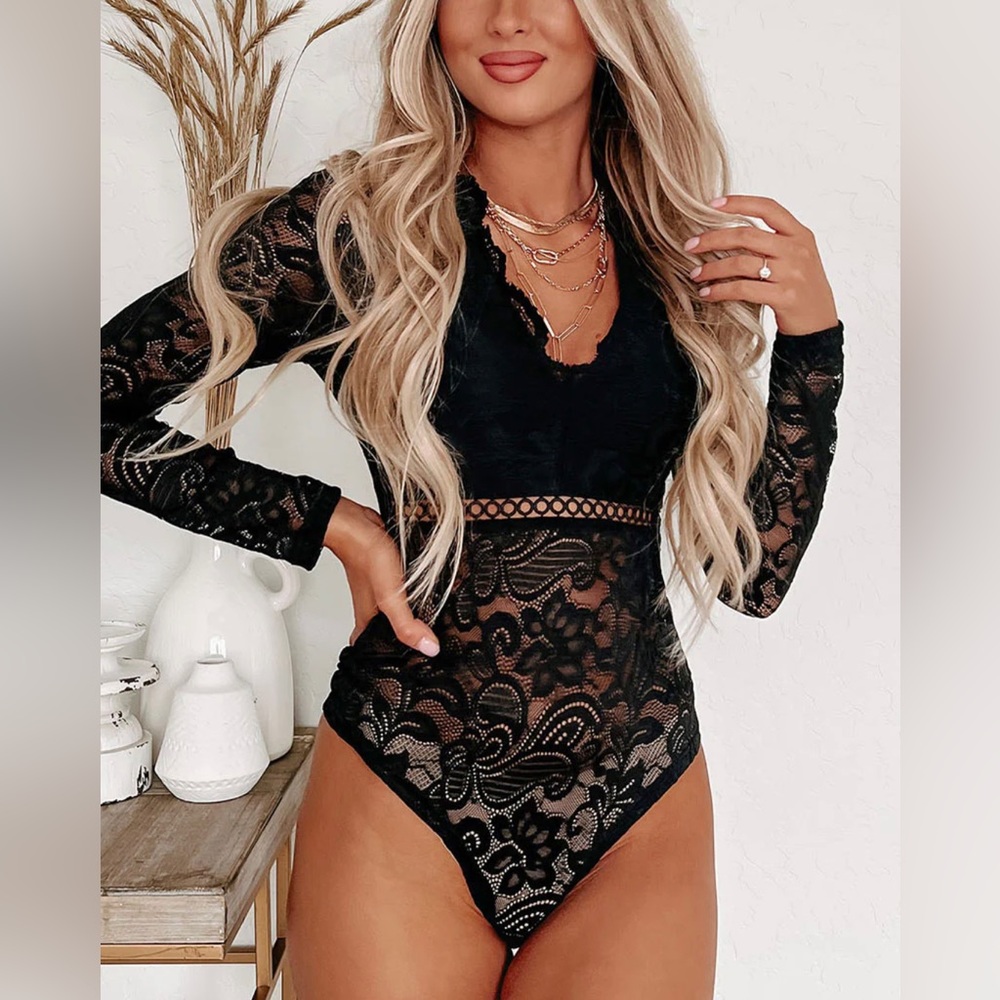 NanaMacs bodysuit. Size small. Like new.